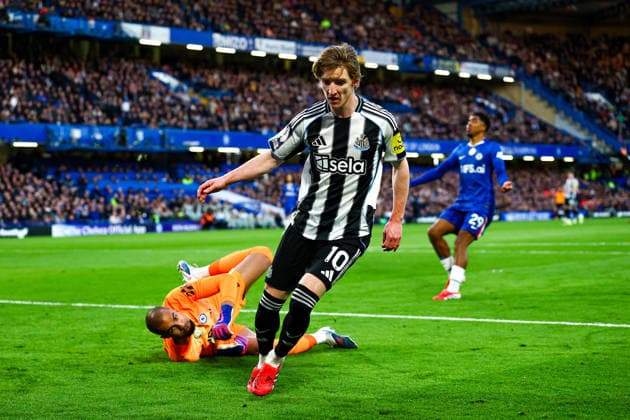 Chelsea v Newcastle United, Premier League Goal 0-1 Newcastle United forward Anthony Gordon (10) scores a goal and celebrates during the Premier League match between Chelsea and Newcastle United at Stamford Bridge, London, UK on 14 March 2026. Editorial use only DataCo restrictions apply See www.football-dataco.com , Copyright: xNigelxKeenex PSI-23886-0064