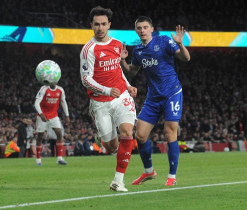 Football - 2025 2026 Premier League - Arsenal vs. Everton - The Emirates Stadium - Saturday 14th March 2026 Martin Zubimendi of Arsenal and Vitalii Mykolenko 