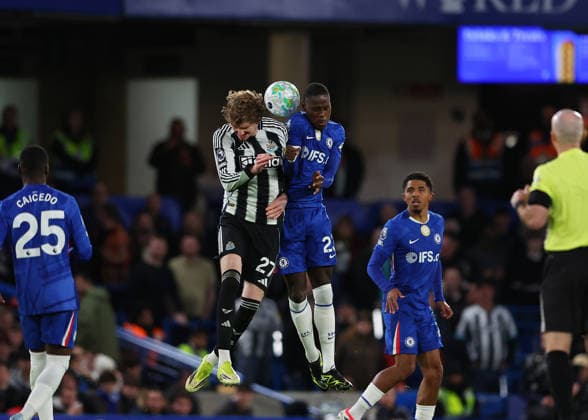 14th March 2026; Stamford Bridge, Chelsea, London, England: Premier League Football, Chelsea versus Newcastle United; Nick Woltemade of Newcastle United under pressure from Trevoh Chalobah of Chelsea  JPxFletcher Content restricted for UK based newspaper