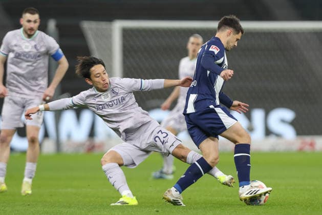 14.03.2026, xtgx, Fussball - 2.Bundesliga Hertha BSC Berlin - VfL Bochum emspor, v.l. Koji Miyoshi (Bochum, 23), Josip Brekalo (Hertha, 7) Zweikampf, Duell, Kampf, tackle (DFL DFB REGULATIONS PROHIBIT ANY USE OF PHOTOGRAPHS as IMAGE SEQUENCES and or QUASI-VIDEO) Berlin