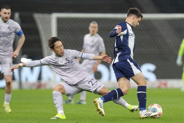 14.03.2026, xtgx, Fussball - 2.Bundesliga Hertha BSC Berlin - VfL Bochum emspor, v.l. Koji Miyoshi (Bochum, 23), Josip Brekalo (Hertha, 7) Zweikampf, Duell, Kampf, tackle (DFL DFB REGULATIONS PROHIBIT ANY USE OF PHOTOGRAPHS as IMAGE SEQUENCES and or QUASI-VIDEO) Berlin