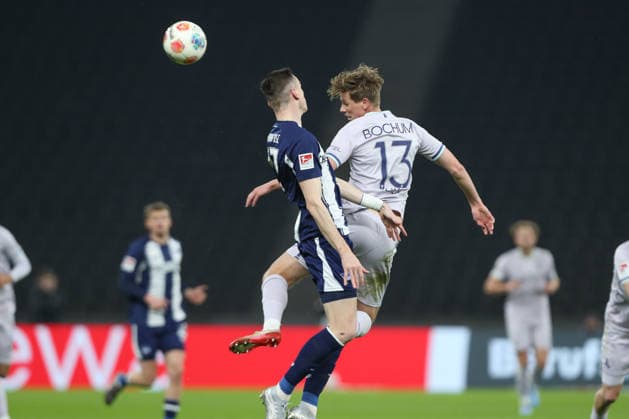 14.03.2026, xtgx, Fussball - 2.Bundesliga Hertha BSC Berlin - VfL Bochum emspor, v.l. Niklas Kolbe (Hertha, 27), Oliver Olsen (Bochum, 13) Zweikampf, Duell, Kampf, tackle (DFL DFB REGULATIONS PROHIBIT ANY USE OF PHOTOGRAPHS as IMAGE SEQUENCES and or QUASI-VIDEO) Berlin