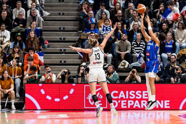 LYON-VILLEURBANNE, FRANCE - MARCH 14: Janelle Salaun (France, 13) shoots a three pointer over Leonie Fiebich (Germany, 13) during the FIBA Women™s World Cup Qualifying Tournament match between Germany (GER) vs. France (FRA) at Astroballe on matchday 3 of the FIBA Women™s World Cup Qualifying Tournament on March 14, 2026 in Lyon-Villeurbanne, France. France Copyright: xSteffiexWunderlx