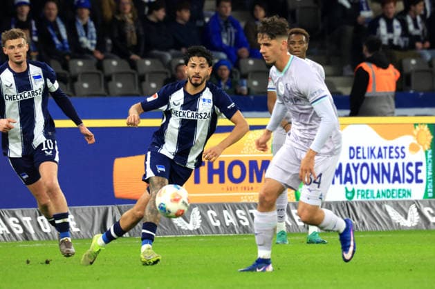 DEU, DFL, 2. FBL, Hertha BSC vs. VfL Bochum, 14.03.2026, Berliner Olympiastadion, Berlin, DEU, DFL, 2. FBL, Hertha BSC vs. VfL Bochum, im Bild Kevin Sessa (Hertha BSC Berlin 8), CAJETAN LENZ (VfL Bochum 34) DFL - regulations prohibit any use of Photographs as image sequences and or quasi-video