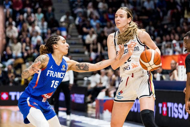 LYON-VILLEURBANNE, FRANCE - MARCH 14: Emily Bessoir (Germany, 22) controls the ball against Gabby Williams (France, 15) during the FIBA Women™s World Cup Qualifying Tournament match between Germany (GER) vs. France (FRA) at Astroballe on matchday 3 of the FIBA Women™s World Cup Qualifying Tournament on March 14, 2026 in Lyon-Villeurbanne, France. France Copyright: xSteffiexWunderlx