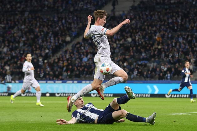 14.03.2026, xtgx, Fussball - 2.Bundesliga Hertha BSC Berlin - VfL Bochum emspor, Oliver Olsen (Bochum, 13), Niklas Kolbe (Hertha, 27) Zweikampf, Duell, Kampf, tackle (DFL DFB REGULATIONS PROHIBIT ANY USE OF PHOTOGRAPHS as IMAGE SEQUENCES and or QUASI-VIDEO) Berlin