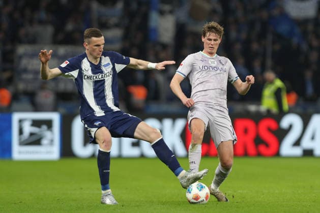14.03.2026, xtgx, Fussball - 2.Bundesliga Hertha BSC Berlin - VfL Bochum emspor, Oliver Olsen (Bochum, 13), Niklas Kolbe (Hertha, 27) Zweikampf, Duell, Kampf, tackle (DFL DFB REGULATIONS PROHIBIT ANY USE OF PHOTOGRAPHS as IMAGE SEQUENCES and or QUASI-VIDEO) Berlin