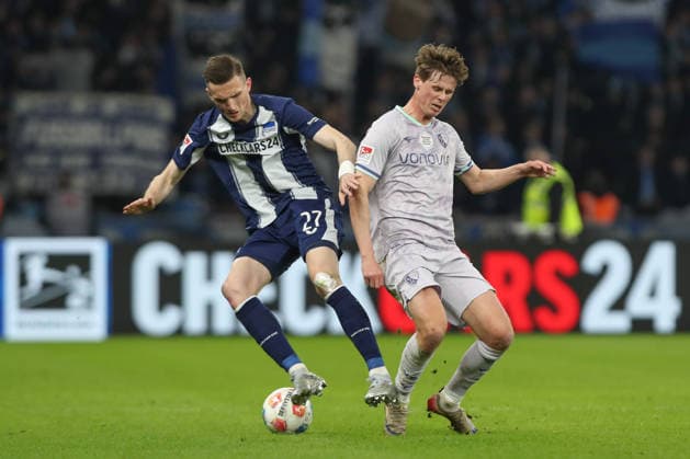 14.03.2026, xtgx, Fussball - 2.Bundesliga Hertha BSC Berlin - VfL Bochum emspor, Oliver Olsen (Bochum, 13), Niklas Kolbe (Hertha, 27) Zweikampf, Duell, Kampf, tackle (DFL DFB REGULATIONS PROHIBIT ANY USE OF PHOTOGRAPHS as IMAGE SEQUENCES and or QUASI-VIDEO) Berlin