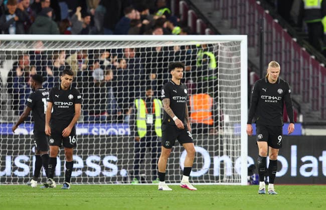 London, England, 14th March 2026. Erling Haaland (R) of Manchester City looks dejected after Konstantinos Mavropanos of West Ham United scores to make it 1-1 during the West Ham United vs Manchester City Premier League match at the London Stadium, London. Picture credit should read: Paul Terry Sportimage EDITORIAL USE ONLY. No use with unauthorised audio, video, data, fixture lists, club league logos or live services. Online in-match use limited to 120 images, no video emulation. No use in betting, games or single club league player publications. SPI_023_PT_West_Ham_Man_City SPI-4602-0024