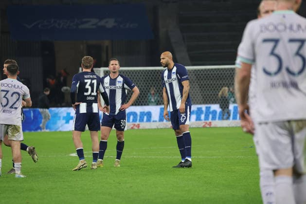 BERLIN, DEUTSCHLAND - MARCH 14: final whistle, end of game, Marton Dardai (Hertha, 31), Paul Seguin (Hertha, 30) and John Brooks (Hertha, 25) disappointed, dissatisfied, frustration, during the match in the 2. German Bundesliga: Hertha BSC - VfL Bochum at Olympiastadion on matchday 26 on March 14, 2026 in Berlin, Deutschland. DFB regulations prohibit any use of photographs as image sequences and or quasi video. Berlin Deutschland Copyright: xO.Frankex