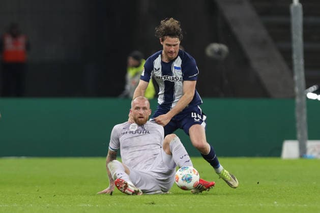 14.03.2025, xtgx, Fussball 2. Bundesliga, Hertha BSC Berlin - VfL Bochum emspor, v.l. Philipp Hofmann (Bochum, 33), Linus Gechter (Hertha, 44) Zweikampf, Duell, Kampf, tackle (DFL DFB REGULATIONS PROHIBIT ANY USE OF PHOTOGRAPHS as IMAGE SEQUENCES and or QUASI-VIDEO) Berlin