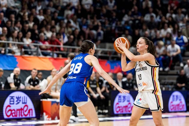 LYON-VILLEURBANNE, FRANCE - MARCH 14: Britta Daub (Germany, 19) controls the ball against Pauline Astier (France, 98) during the FIBA Women™s World Cup Qualifying Tournament match between Germany (GER) vs. France (FRA) at Astroballe on matchday 3 of the FIBA Women™s World Cup Qualifying Tournament on March 14, 2026 in Lyon-Villeurbanne, France. France Copyright: xSteffiexWunderlx