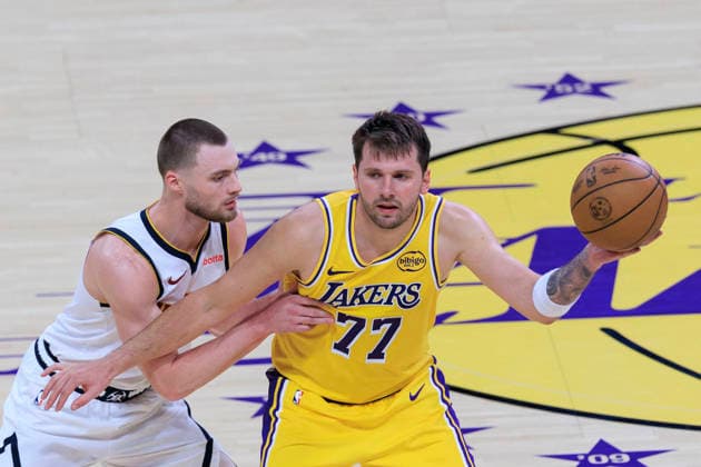 March 14, 2026, Los Angeles, California, USA: Luka Doncic 77 of the Los Angeles Lakers receives the inbound ball as Christian Braun 0 of the Denver Nuggets defends during their regular season NBA, Basketball Herren, USA game on Saturday March 14, 2026 at Crypto.com Arena in Los Angeles, California. Lakers defeat Nuggets, 127-125. ARIANA RUIZ PI Lakers Vs. Nuggets  - ZUMAp124 20260314_zaa_p124_043 Copyright: xArianaxRuizx