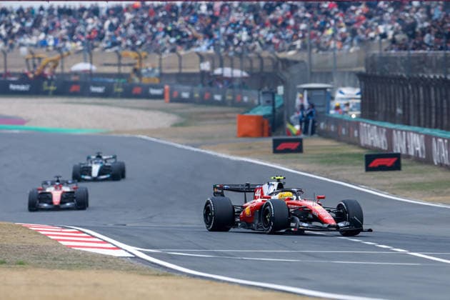 CHINA-MOTORSPORTS F1-SHANGHAI Ferrari™s Lewis Hamilton followed by Ferrari™s Charles Leclerc and Mercedes™ George Russell at Shanghai International Circuit during the race at the F1 Chinese Grand Prix, Shanghai, China, March 15, 2026. NEXPHER Peter Li SHANGHAI