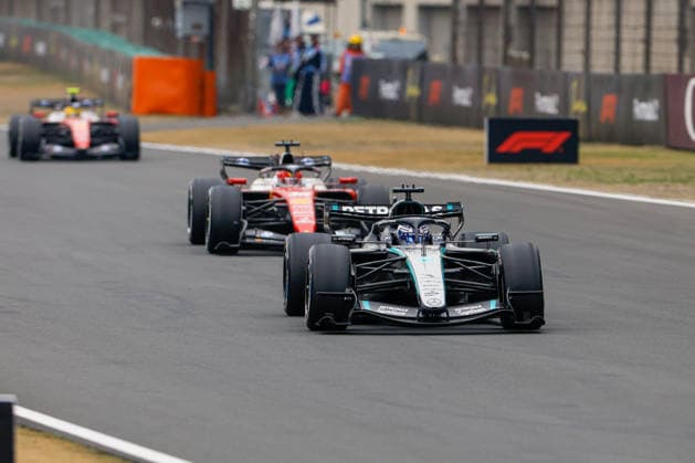 CHINA-MOTORSPORTS F1-SHANGHAI Mercedes™ George Russell followed by Ferrari™s Lewis Hamilton and Ferrari™s Charles Leclerc in action at Shanghai International Circuit during the race at the F1 Chinese Grand Prix, Shanghai, China, March 15, 2026. NEXPHER Peter Li SHANGHAI