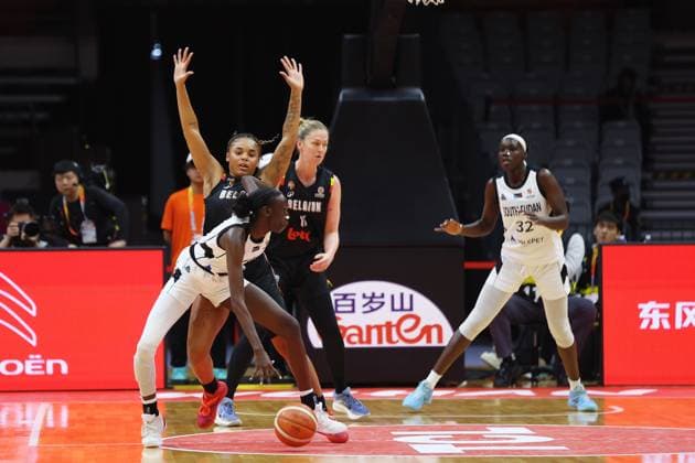 South Sudan s Nyamer Lual Diew and Belgium s Maxuella Lisowa Mbaka fight for the ball during a basket game between Belgium s national team, Nationalteam Belgian Cats and South Sudan, in Wuhan, China, on Sunday 15 March 2026, the fourth game (out of 5) of the qualifications phase for the World Cup Basket tournament. NIKOLAxKRSTIC  x167535491x