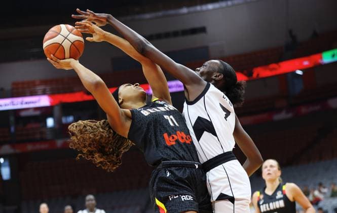 Belgium s Alicia Courthiau and South Sudan s Nyamer Lual Diew fight for the ball during a basket game between Belgium s national team, Nationalteam Belgian Cats and South Sudan, in Wuhan, China, on Sunday 15 March 2026, the fourth game (out of 5) of the qualifications phase for the World Cup Basket tournament. NIKOLAxKRSTIC  x167536474x