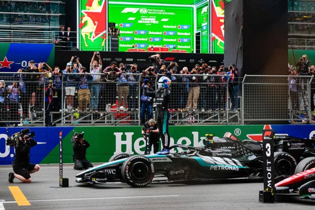 CHINA-MOTORSPORTS F1-SHANGHAI Mercedes™ Kimi Antonelli stands on his f1 car celebrating after winning at Shanghai International Circuit during the race at the F1 Chinese Grand Prix, Shanghai, China, March 15, 2026. NEXPHER Peter Li SHANGHAI