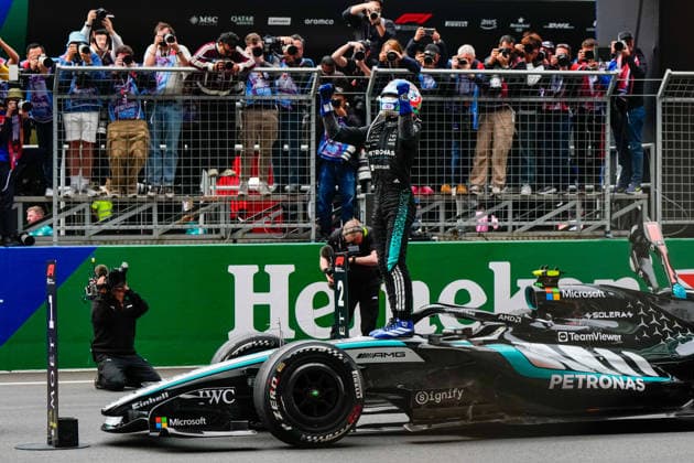 CHINA-MOTORSPORTS F1-SHANGHAI Mercedes™ Kimi Antonelli stands on his f1 car celebrating after winning at Shanghai International Circuit during the race at the F1 Chinese Grand Prix, Shanghai, China, March 15, 2026. NEXPHER Peter Li SHANGHAI