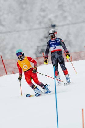 PARALYMPICS - Winter Paralympics Milano Cortina 2026 CORTINA D AMPEZZO,ITALY,15.MAR.26 - PARALYMPICS, ALPINE SKIING - Paralympic Winter games, Winterspiele,Spiele, Summer games Milano Cortina 2026, slalom, men. Image shows guide Lilly Sammer and Michael Scharnagl (AUT).  GEPAxpictures xMatthiasxTrinkl