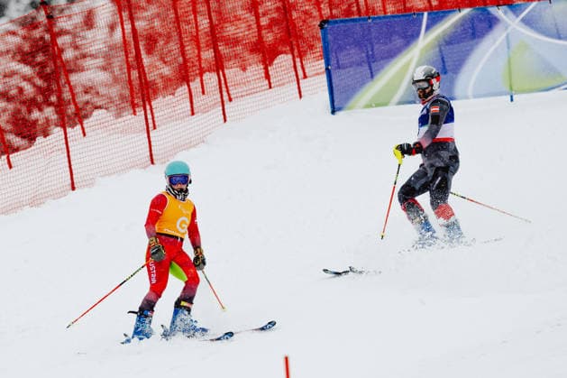 PARALYMPICS - Winter Paralympics Milano Cortina 2026 CORTINA D AMPEZZO,ITALY,15.MAR.26 - PARALYMPICS, ALPINE SKIING - Paralympic Winter games, Winterspiele,Spiele, Summer games Milano Cortina 2026, slalom, men. Image shows guide Lilly Sammer and Michael Scharnagl (AUT).  GEPAxpictures xMatthiasxTrinkl