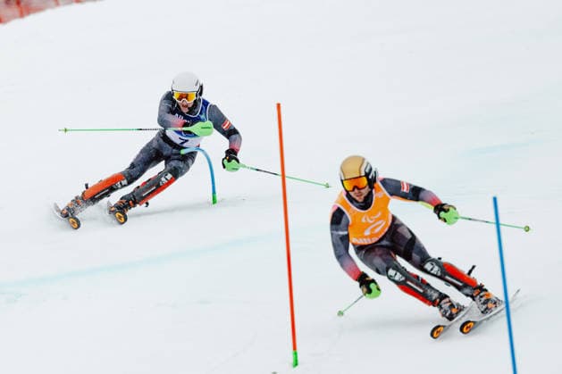 PARALYMPICS - Winter Paralympics Milano Cortina 2026 CORTINA D AMPEZZO,ITALY,15.MAR.26 - PARALYMPICS, ALPINE SKIING - Paralympic Winter games, Winterspiele,Spiele, Summer games Milano Cortina 2026, slalom, men. Image shows guide Nico Haberl and Johannes Aigner (AUT).  GEPAxpictures xMatthiasxTrinkl