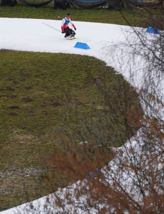 (260315) -- TESERO, March 15, 2026 -- Wang Tao of China competes during the para cross-country skiing men s 20km interval start sitting at the Milan-Cortina 2026 Paralympic Winter games, Winterspiele,Spiele, Summer games in Tesero, Italy, March 15, 2026. ) (SP)ITALY-TESERO-PARALYMPIC WINTER GAMES-PARA CROSS-COUNTRY SKIING-MEN S 20KM INTERVAL START SITTING LianxZhen 