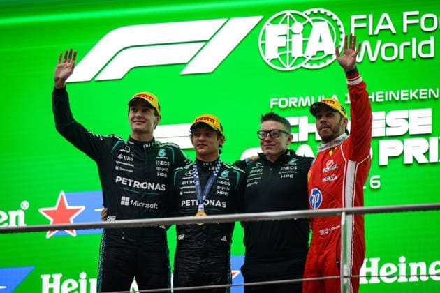 Formula 1 Chinese Grand Prix 2026 SHANGHAI, CHINA - MARCH 15: Race winner Andrea Kimi Antonelli of Italy and Mercedes AMG Petronas F1 Team Second placed George Russell of Great Britain and Mercedes AMG Petronas F1 Team Third placed Lewis Hamilton of Great Britain and Scuderia Ferrari and Peter Bonnington, Race Engineer of Mercedes AMG Petronas F1 Team on the podium during the F1 Grand Prix of China at Shanghai International Circuit on March 15, 2026 in Shanghai, China. John Ricky Anadolu Shanghai China. Editorial use only. Please get in touch for any other usage.  Copyright: x2026xAnadoluxJohnxRickyx