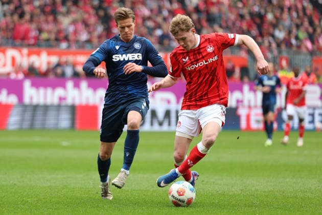 15.03.2026, xrekx, Fussball 2.Bundesliga, 1.FC Kaiserslautern - Karlsruher SC v.l. Dzenis Burnic (Karlsruher SC) Mika Haas (1.FC Kaiserslautern) Zweikampf, Aktion, action, battle for the ball (DFL DFB REGULATIONS PROHIBIT ANY USE OF PHOTOGRAPHS as IMAGE SEQUENCES and or QUASI-VIDEO) Kaiserslautern