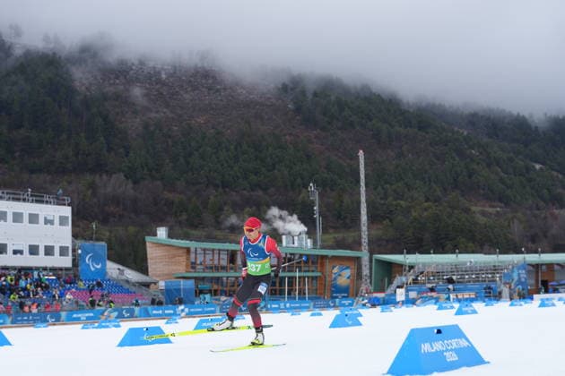 (260315) -- TESERO, March 15, 2026 -- Cai Jiayun of China competes during the para cross-country skiing men s 20km interval start free standing at the Milan-Cortina 2026 Paralympic Winter games, Winterspiele,Spiele, Summer games in Tesero, Italy, March 15, 2026. ) (SP)ITALY-TESERO-PARALYMPIC WINTER GAMES-PARA CROSS-COUNTRY SKIING-MEN S 20KM INTERVAL START FREE STANDING HouxZhaokang 
