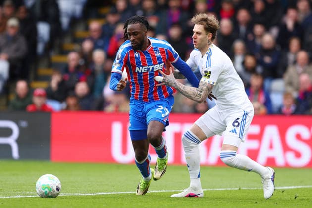 London, England, 15th March 2026. Evann Guessand of Crystal Palace and Joe Rodon of Leeds United challenge for the ball during the Crystal Palace vs Leeds United Premier League match at Selhurst Park, London. Picture credit should read: Paul Terry Sportimage EDITORIAL USE ONLY. No use with unauthorised audio, video, data, fixture lists, club league logos or live services. Online in-match use limited to 120 images, no video emulation. No use in betting, games or single club league player publications. SPI_013_PT_Crystal_Palace_Leeds SPI-4603-0013