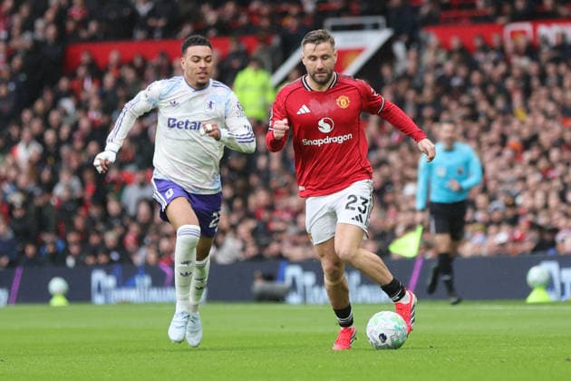 15th March 2026; Old Trafford, Manchester, England; Premier League Football, Manchester United, ManU versus Aston Villa; Luke Shaw of Manchester United is tracked by Lamare Bogarde of Aston Villa  RogerxEvans Content restricted for UK based newspaper