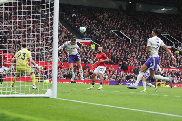 15th March 2026; Old Trafford, Manchester, England; Premier League Football, Manchester United, ManU versus Aston Villa; Lucas Digne of Aston Villa heads the ball clear  RogerxEvans Content restricted for UK based newspaper