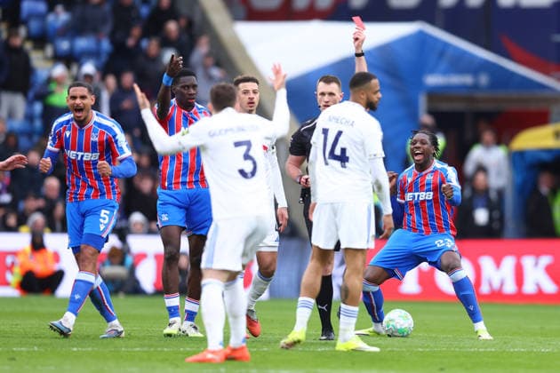 London, England, 15th March 2026. Maxence Lacroix (L) and Jaydee Canvot (R) of Crystal Palace celebrate as Gabriel Gudmundsson of Leeds United is shown a red card during the Crystal Palace vs Leeds United Premier League match at Selhurst Park, London. Picture credit should read: Paul Terry Sportimage EDITORIAL USE ONLY. No use with unauthorised audio, video, data, fixture lists, club league logos or live services. Online in-match use limited to 120 images, no video emulation. No use in betting, games or single club league player publications. SPI_022_PT_Crystal_Palace_Leeds SPI-4603-0022