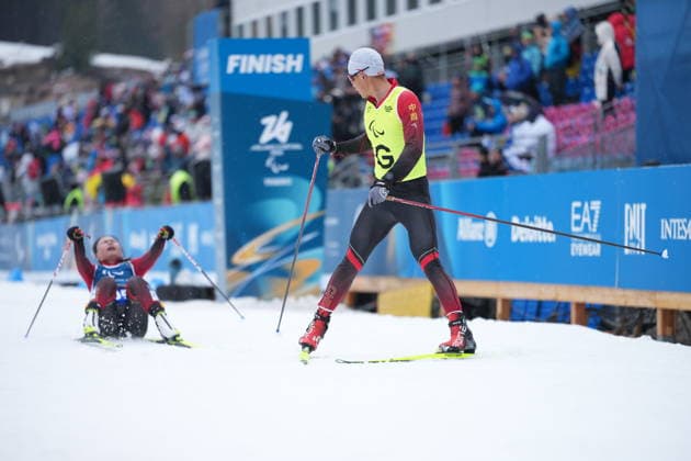 (260315) -- TESERO, March 15, 2026 -- Cong Jihong (L) and her guide Liu Jiaxuan of China react after the para cross-country skiing women s 20km interval start free vision impaired at the Milan-Cortina 2026 Paralympic Winter games, Winterspiele,Spiele, Summer games in Tesero, Italy, March 15, 2026. ) (SP)ITALY-TESERO-PARALYMPIC WINTER GAMES-PARA CROSS-COUNTRY SKIING-WOMEN S 20KM INTERVAL START FREE VISION IMPAIRED HouxZhaokang 