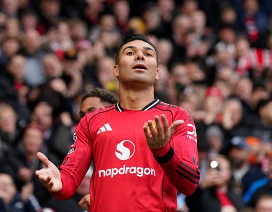 Manchester, England, 15th March 2026. Casemiro of Manchester United, ManU celebrates scoring the first goal during the Manchester United vs Aston Villa Premier League match at Old Trafford, Manchester. Picture credit should read: Andrew Yates Sportimage EDITORIAL USE ONLY. No use with unauthorised audio, video, data, fixture lists, club league logos or live services. Online in-match use limited to 120 images, no video emulation. No use in betting, games or single club league player publications. SPI_051_AY_Man_Utd_Villa SPI-4605-0051