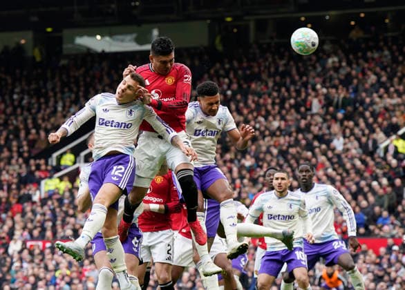 Manchester, England, 15th March 2026. Casemiro of Manchester United, ManU scoring the first goal during the Manchester United vs Aston Villa Premier League match at Old Trafford, Manchester. Picture credit should read: Andrew Yates Sportimage EDITORIAL USE ONLY. No use with unauthorised audio, video, data, fixture lists, club league logos or live services. Online in-match use limited to 120 images, no video emulation. No use in betting, games or single club league player publications. SPI_057_AY_Man_Utd_Villa SPI-4605-0057