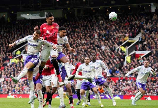 Manchester, England, 15th March 2026. Casemiro of Manchester United, ManU scoring the first goal during the Manchester United vs Aston Villa Premier League match at Old Trafford, Manchester. Picture credit should read: Andrew Yates Sportimage EDITORIAL USE ONLY. No use with unauthorised audio, video, data, fixture lists, club league logos or live services. Online in-match use limited to 120 images, no video emulation. No use in betting, games or single club league player publications. SPI_058_AY_Man_Utd_Villa SPI-4605-0058