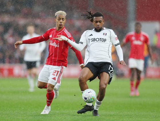 Nottingham, England, 15th March 2026. Omari Hutchinson of Nottingham Forest and Alex Iwobi of Fulham during the Nottingham Forest vs Fulham Premier League match at the City Ground, Nottingham. Picture credit should read: Gareth Evans Sportimage EDITORIAL USE ONLY. No use with unauthorised audio, video, data, fixture lists, club league logos or live services. Online in-match use limited to 120 images, no video emulation. No use in betting, games or single club league player publications. SPI_027_GE_NFFC_vs_FFC SPI-4604-0027