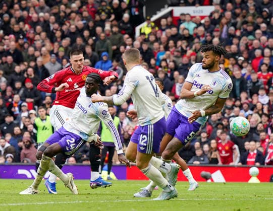 Manchester, England, 15th March 2026. Benjamin Sesko of Manchester United, ManU scores their third goal during the Manchester United vs Aston Villa Premier League match at Old Trafford, Manchester. Picture credit should read: Andrew Yates Sportimage EDITORIAL USE ONLY. No use with unauthorised audio, video, data, fixture lists, club league logos or live services. Online in-match use limited to 120 images, no video emulation. No use in betting, games or single club league player publications. SPI_071_AY_Man_Utd_Villa SPI-4605-0071