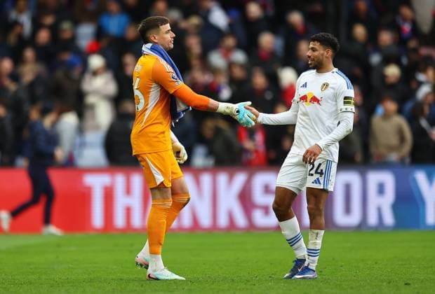 Karl Darlow of Leeds United seen with James Justin of Leeds United after the match Crystal Palace v Leeds United, Premier League, Football, Selhurst Park, London, UK - 15 Mar 2026London Selhurst Park United Kingdom EDITORIAL USE ONLY No use with unauthorised audio, video, data, fixture lists, club league logos or live services. Online in-match use limited to 120 images, no video emulation. No use in betting, games or single club league player publications. Copyright: xMichaelxZemanek Shutterstockx 16757310aj