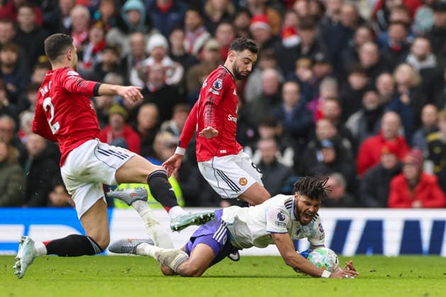 Manchester United, ManU v Aston Villa, Premier League Manchester United midfielder Bruno Fernandes (8) Aston Villa defender Tyrone Mings (5) battle during the Manchester United v Aston Villa Premier League match at Old Trafford, Manchester, England on 15 March 2026 Credit: Phil Duncan Every Second Media Editorial use only. All images are copyright Every Second Media Limited. No images may be reproduced without prior permission. All rights reserved. Premier League and Football League images are subject to licensing agreements with Football DataCo Limited. see https: www.football-dataco.com Copyright: xIMAGO EveryxSecondxMediax ESM-1860-0086 PhilxDuncanx xEveryxSecondxMediax