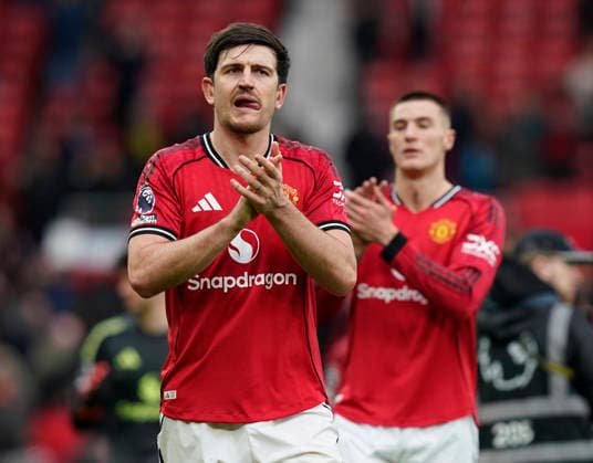 Manchester, England, 15th March 2026. Harry Maguire of Manchester United, ManU calls the fans during the Manchester United vs Aston Villa Premier League match at Old Trafford, Manchester. Picture credit should read: Andrew Yates Sportimage EDITORIAL USE ONLY. No use with unauthorised audio, video, data, fixture lists, club league logos or live services. Online in-match use limited to 120 images, no video emulation. No use in betting, games or single club league player publications. SPI_089_AY_Man_Utd_Villa SPI-4605-0089