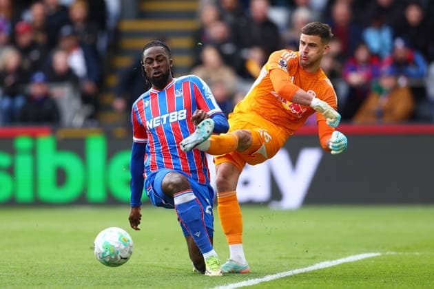 London, England, 15th March 2026. Evann Guessand of Crystal Palace and Karl Darlow of Leeds United challenge for the ball during the Crystal Palace vs Leeds United Premier League match at Selhurst Park, London. Picture credit should read: Paul Terry Sportimage EDITORIAL USE ONLY. No use with unauthorised audio, video, data, fixture lists, club league logos or live services. Online in-match use limited to 120 images, no video emulation. No use in betting, games or single club league player publications. SPI_043_PT_Crystal_Palace_Leeds SPI-4603-0043
