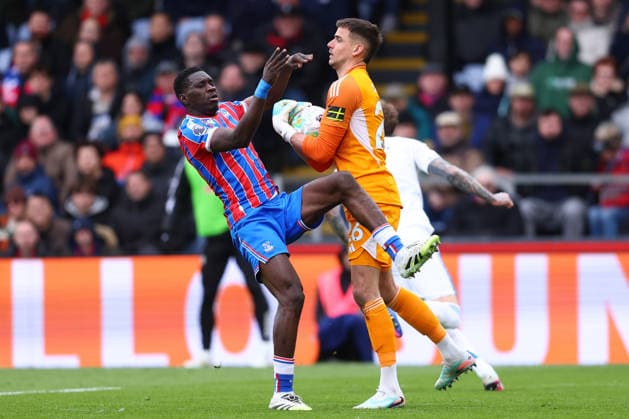 London, England, 15th March 2026. Ismaila Sarr of Crystal Palace and Karl Darlow of Leeds United challenge for the ball during the Crystal Palace vs Leeds United Premier League match at Selhurst Park, London. Picture credit should read: Paul Terry Sportimage EDITORIAL USE ONLY. No use with unauthorised audio, video, data, fixture lists, club league logos or live services. Online in-match use limited to 120 images, no video emulation. No use in betting, games or single club league player publications. SPI_045_PT_Crystal_Palace_Leeds SPI-4603-0045