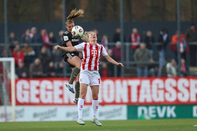 Georgia Stanway (FC Bayern München) und Pauline Bremer (1.FC Köln) im Zweikampf waehrend des Spiels der Frauen Bundesliga zwischen 1.FC Köln und Bayern München, Franz-Kremer-Stadion am 15. März in Köln, Deutschland. (Foto von Oliver Kaelke DeFodi Images) +++ Georgia Stanway (FC Bayern München) und Pauline Bremer (1.FC Köln) battle for the ball during the Woman Bundesliga match between 1.FC Köln and Bayern München at Franz-Kremer-Stadion on March 15, 2026 in Cologne, Germany. (Photo by Oliver Kaelke DeFodi Images) DFL regulations prohibit any use of photographs as image sequences and or quasi-video. (Photo by Oliver Kaelke DeFodi Images) -
