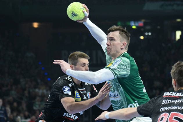 15.03.2026, xlakx, Handball Daikin HBL, Fuechse Berlin - HC Erlangen v.l.Viggo Kristjansson (HC Erlangen), Lasse Andersson (Fuechse Berlin) Zweikampf, Duell, Kampf, tackle Berlin
