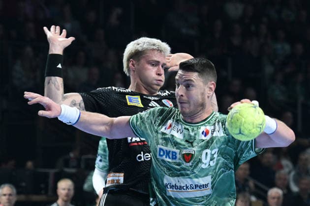 15.03.2026, xlakx, Handball Daikin HBL, Fuechse Berlin - HC Erlangen v.l.Marek Nissen (HC Erlangen), Mijajlo Marsenic (Fuechse Berlin) Zweikampf, Duell, Kampf, tackle Berlin