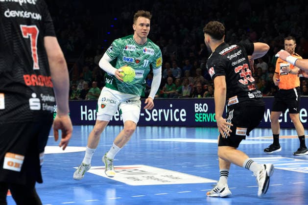 DEU, DHB, 1.HBL, Fuechse Berlin vs.Erlangen, 15.03.2026, Max-Schmeling-Halle, Berlin, DEU, DHB, 1.HBL, Fuechse Berlin vs.Erlangen, im Bild Lasse Andersson (Fuechse Berlin 11), Tobias Buck (Erlangen 39)