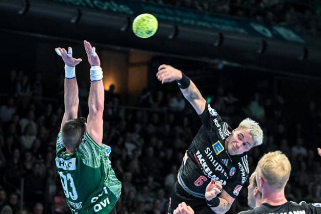 15.03.2026, xlakx, Handball Daikin HBL, Fuechse Berlin - HC Erlangen v.l. Mijajlo Marsenic (Fuechse Berlin), Marek Nissen (HC Erlangen) enttaeuscht, schaut enttaeuscht, niedergeschlagen, disappointed Berlin